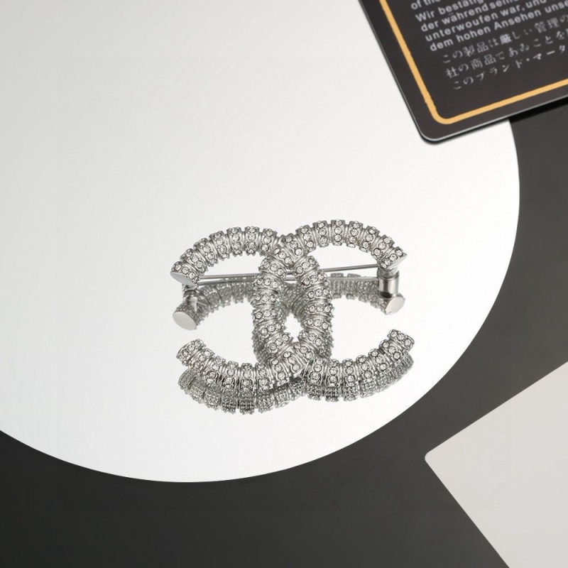 Ch**el brooches